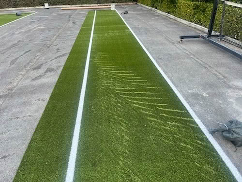 FAULTY tennis turf – lineal meter