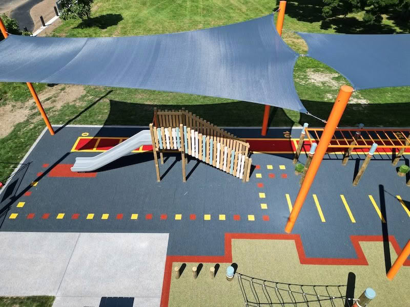 "playground-turf-installation-pukete-park-colourful-surface" - "custom-playground-turf-installation-coolplay-colours-running-track" - "professional-playground-turf-installation-shock-pad-safety" - "synthetic-playground-turf-installation-hand-cut-numbers" - "durable-playground-turf-installation-prepared-base"